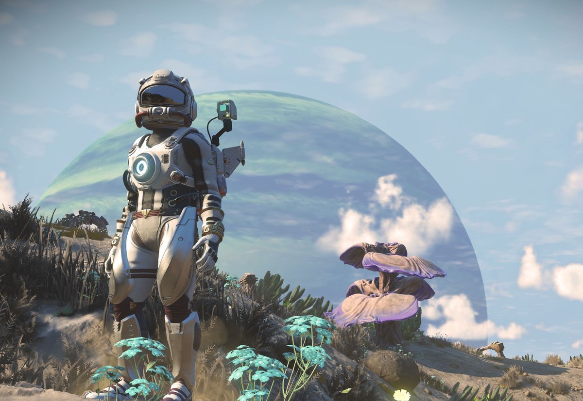 No Man's SkyのiPad版の画面(巨大な惑星を背に立つ探検家。公式ニュースより)